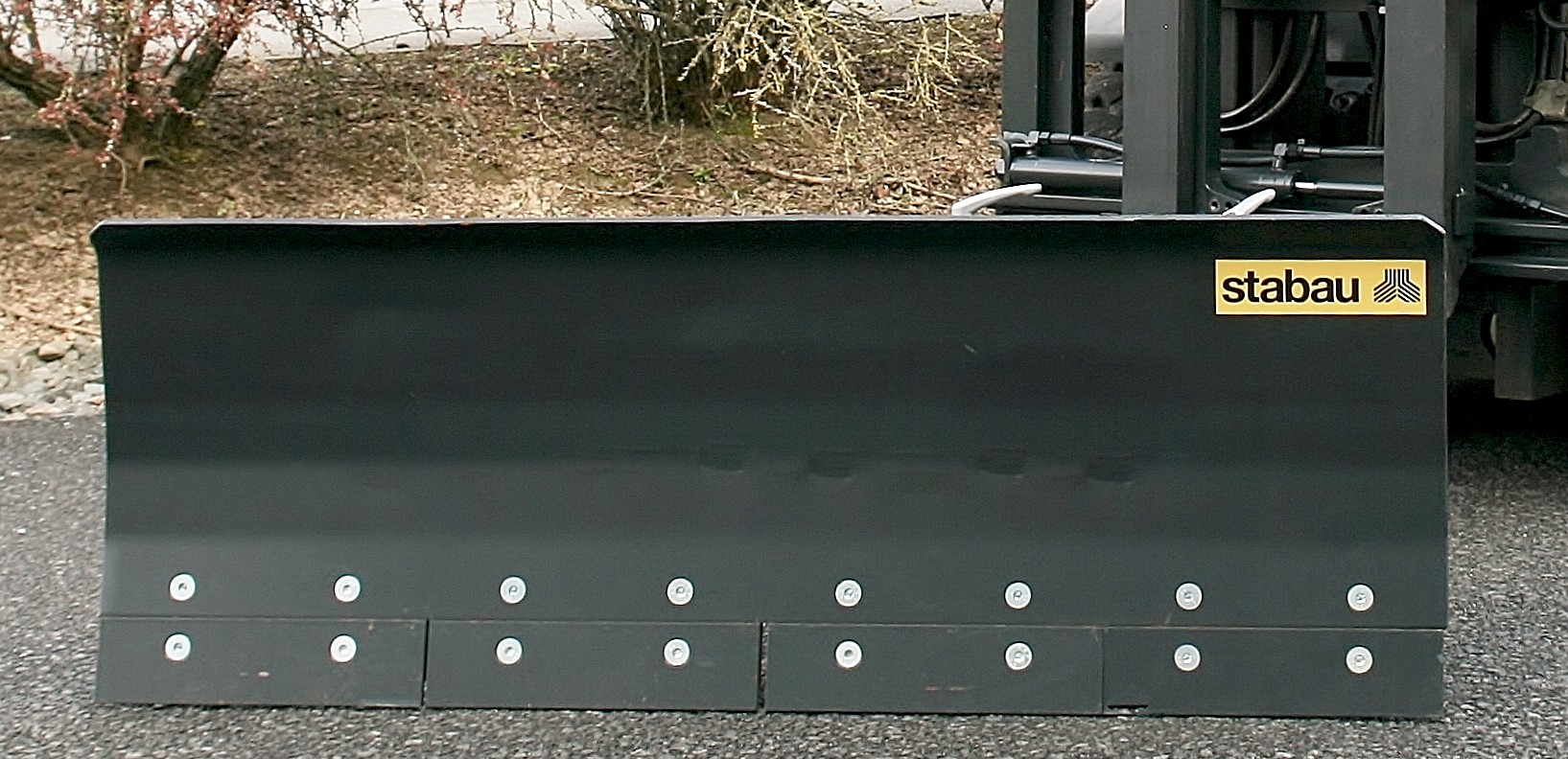 Snow Plow with spring-loaded steel shield trim